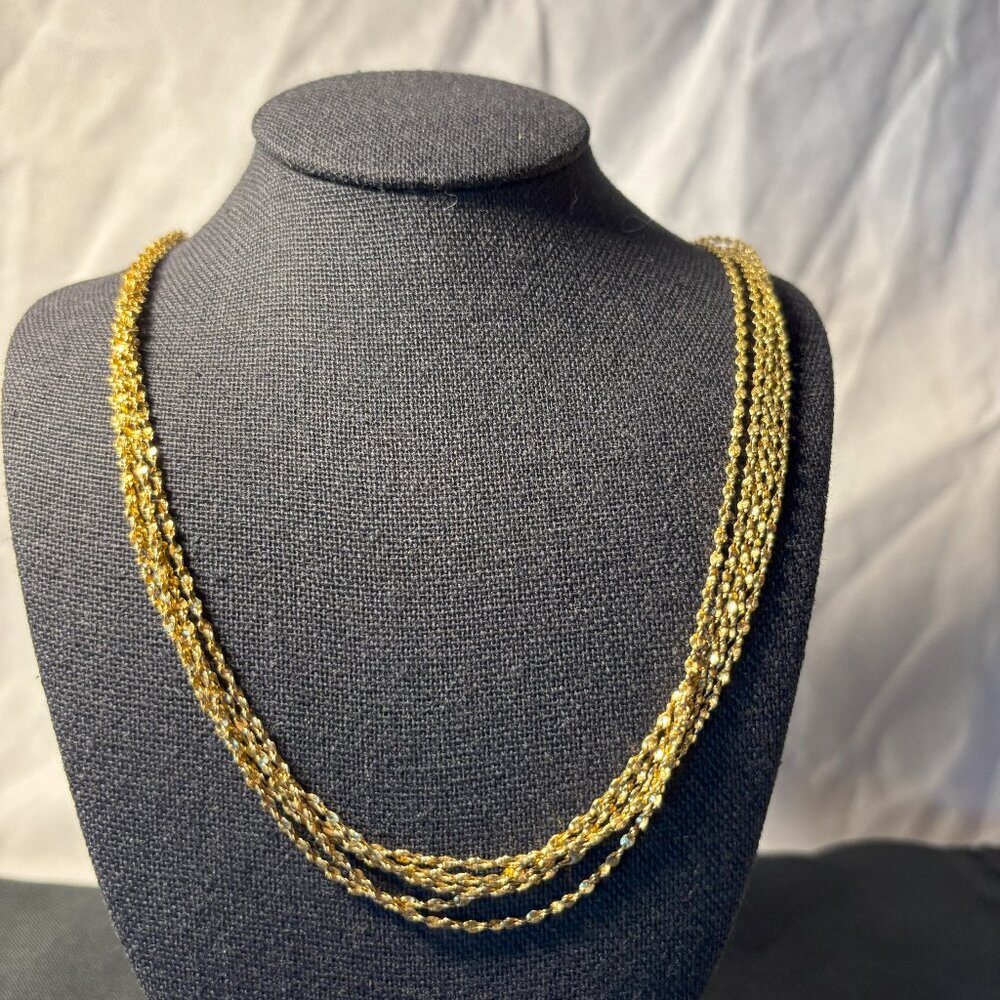 Beautiful Nolan Miller 5 Strand Twisted Gold Chain Necklace.